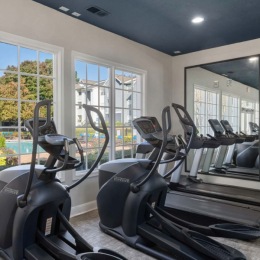 fitness center with exercise equipment