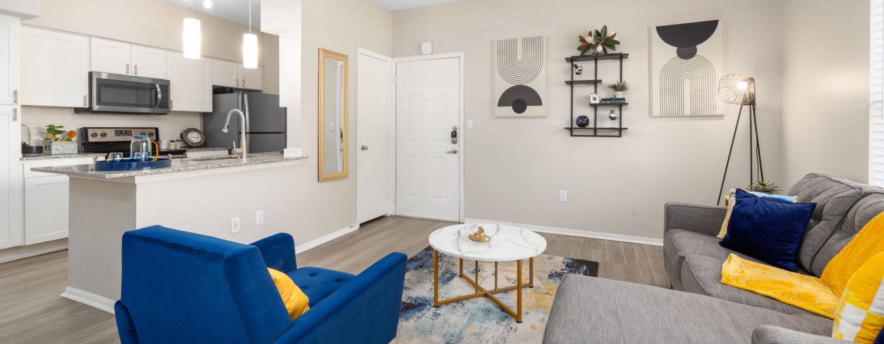 a living room with a blue chair