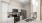 a kitchen with white cabinets